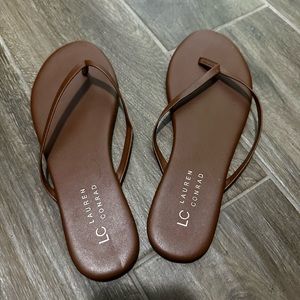 Camel faux leather flip flops